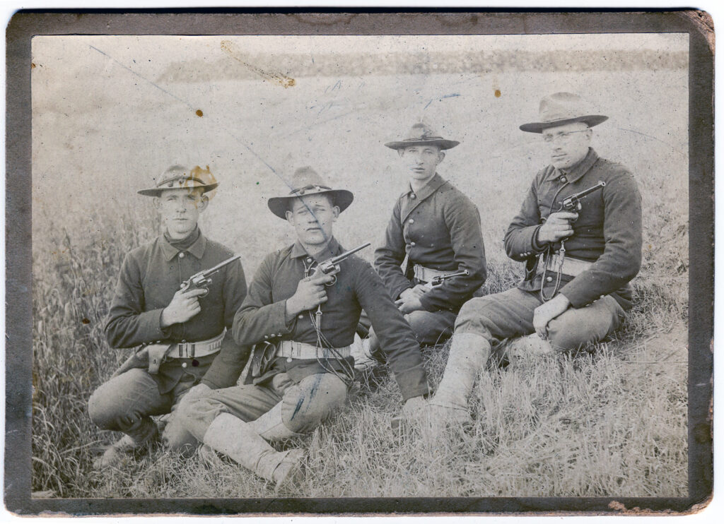 Soldiers with pistols period photo